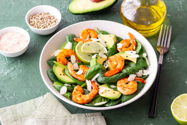 istock Salad with shrimps, avocado, spinach and almonds. Healthy eating. Diet. 1941831735