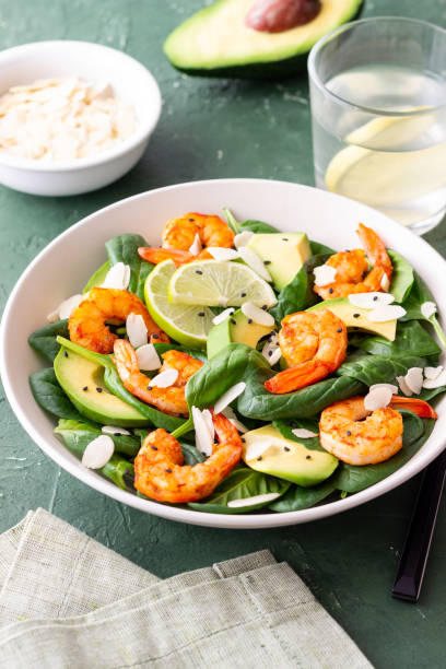 istock Salad with shrimps, avocado, spinach and almonds. Healthy eating. Diet. 1941831748