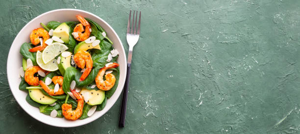 istock Salad with shrimps, avocado, spinach and almonds. Healthy eating. Diet. 1941831765