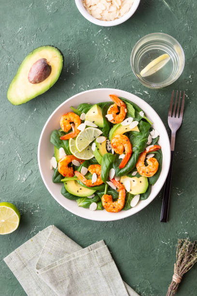 istock Salad with shrimps, avocado, spinach and almonds. Healthy eating. Diet. 1941832296