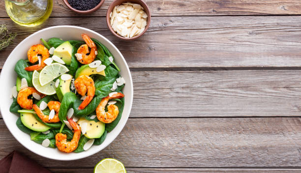 istock Salad with shrimps, avocado, spinach and almonds. Healthy eating. Diet. 1941832819