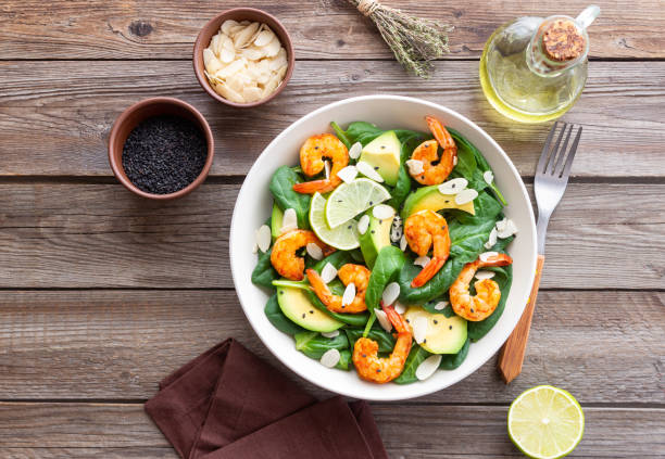 istock Salad with shrimps, avocado, spinach and almonds. Healthy eating. Diet. 1941832820