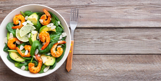 istock Salad with shrimps, avocado, spinach and almonds. Healthy eating. Diet. 1941832824
