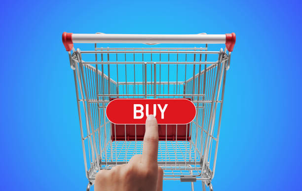 Shopping cart on keyboard button. Online shopping or consumerism, shopaholic concept. 3d rendering
