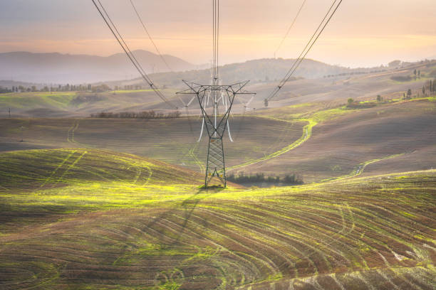 istock Electrical transmission tower in the Tuscany landscape. 1941889216