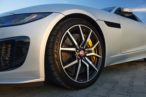 Jaguar F type front wheel. 20 alloy wheel, Pirelli Zero tire. Car in matte paint. Katowice, 17.06.2022