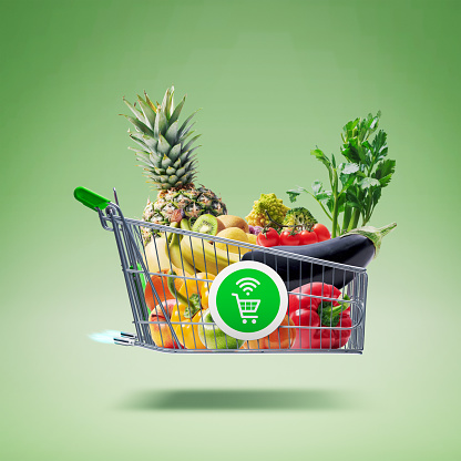 Fast shopping cart with rocket propulsion flying and delivering fresh groceries, online grocery shopping and express delivery concept