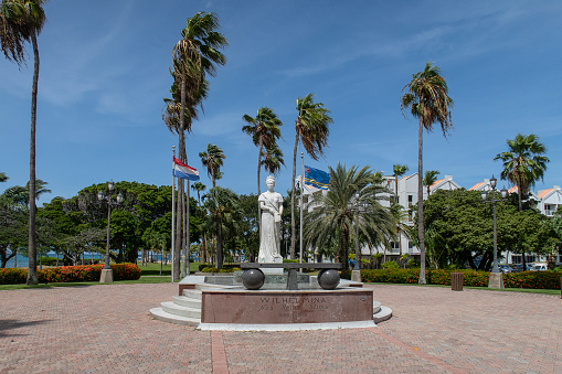 Oranjestad, Aruba - August 12, 2021; Statue of the dutch queen Wilhelmina in the capital city of Aruba, Oranjestad