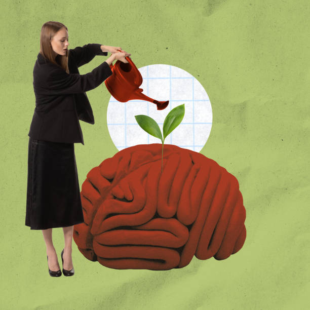 istock Young woman watering blossoming brain. Visual metaphor for cognitive development. Creation of a mental oasis and intellectual richness 1941948206