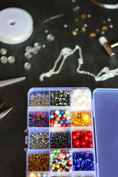 jewelry making supplies - chain storage room equipment gold chain foto e immagini stock