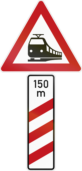 German level crossing distance marker for the right side of the road with warning sign.