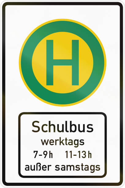 istock German road sign - School bus stop, times for work days except saturday 1941970100