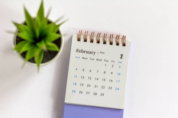 istock Desk calendar for February 2024 on a white background with copy space. 1941998510