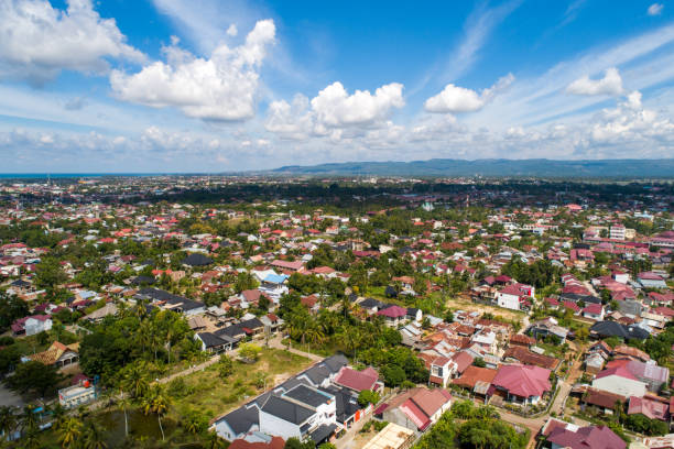istock aerial view of Banda Aceh, blue sky, white clouds 1942055297