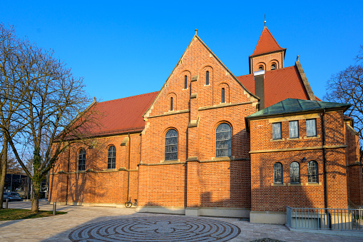Kirchheim Teck, Germany, January 12 2024: Catholic St. Ulrich Church - Brick church built in the French early Gothic style