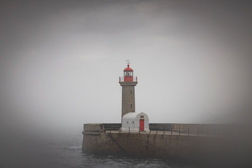 lightouse of Oporto in cloudy day