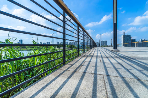 istock Shadow of the bridge rail on the concrete floor. 1942095950