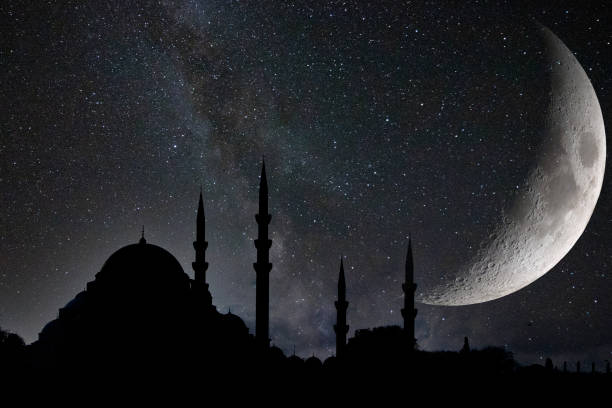istock Suleymaniye Mosque and crescent moon with milky way. 1942105950