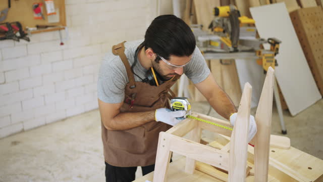Carpenter in workshop.