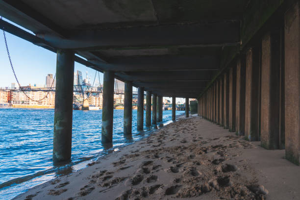 Riverbank in London. The river Thames is low tide