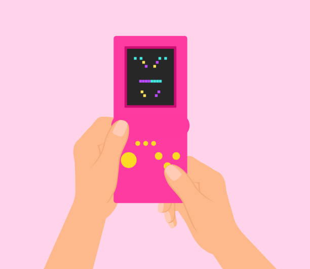 Hand Holding Retro Game Console And Playing Block Stacking Video Game