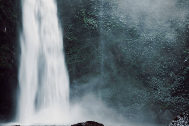 istock Waterfall with powerful flow in Bali, Indonesia. Epic waterfall 1942179624