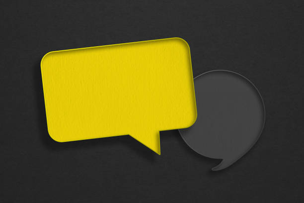 For conceptual image about communication and social media, customer feedback, Blank yellow and grey grunge paper on rough dark paper texture