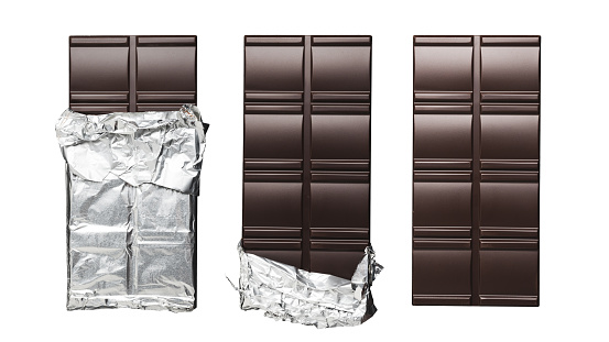 Collage of different dark chocolate bars wrapped in foil, isolated on white background, top view.