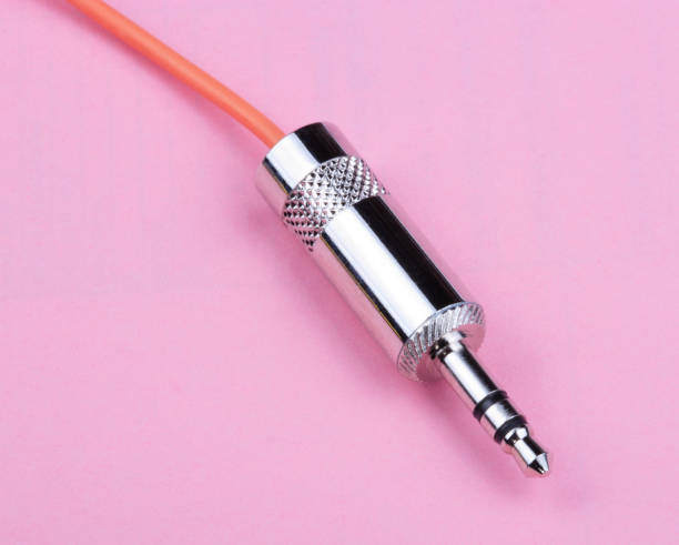 istock Stereo Male Plug Connector on Pink Background 1942209442