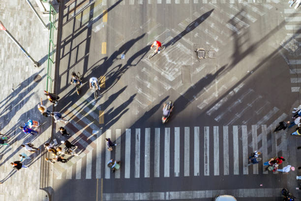 istock A Bustling City Intersection Captured From Above With Pedestrians Crossing in Multiple Directions 1942239784