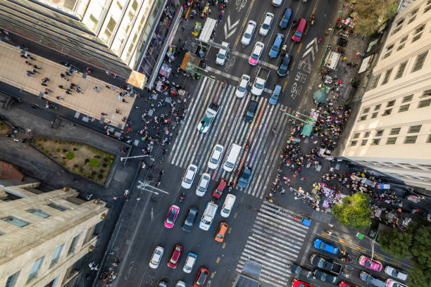 istock A Bustling City Intersection Captured From Above With Pedestrians Crossing in Multiple Directions 1942239813