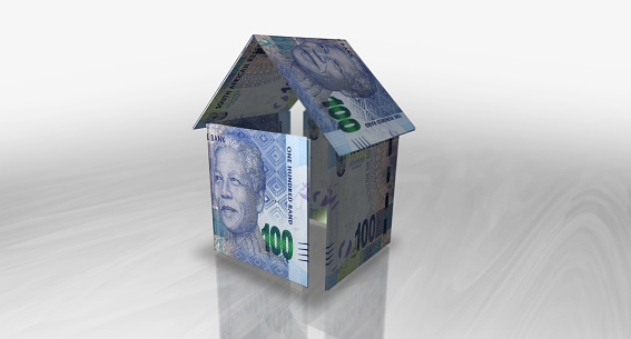 South Africa Rand ZAR money banknotes paper house on the table. South African currency notes 3D illustration concept of home mortgage loan, costs, liabilities and real estate financing.
