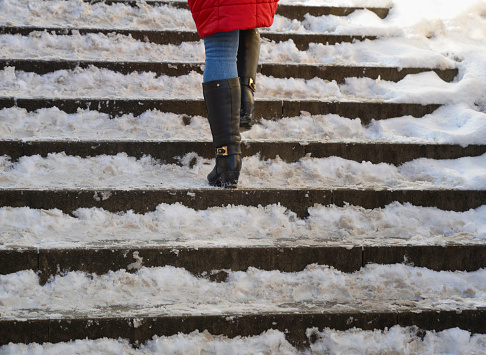 Kyiv. Ukraine. Winter in the city. Uncleared steps of an underground crossing after snowfall.