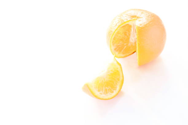 tangerine orange half cut arranging isolated in white background