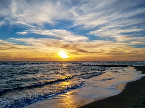 istock Burning sky at sunset reflected in the sea 1942313154
