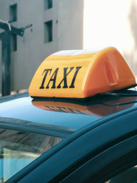 istock taxi sign on a private car 1942323157