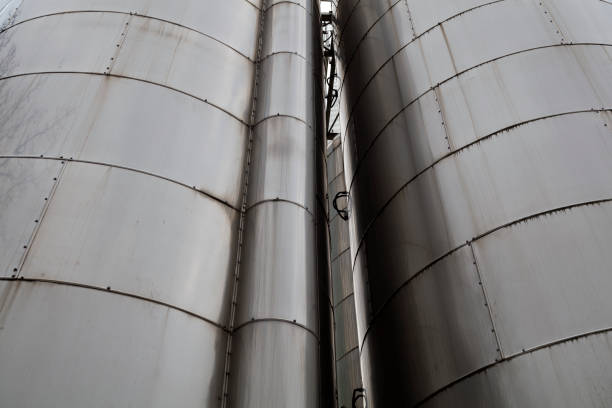 Pipes, tanks, water valves and other outdoor installations of a residential district heating plant.
