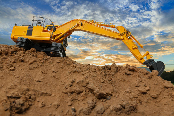 istock Excavators are digging the soil in the construction site 1942336479