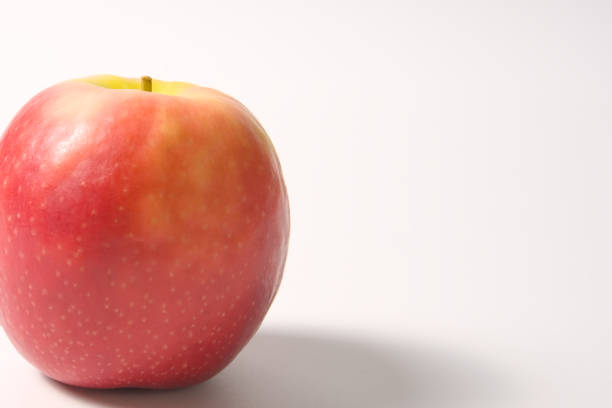Fresh red apples on white background