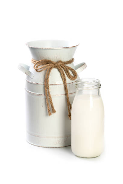 istock Glass of milk and a pitcher 1942395677