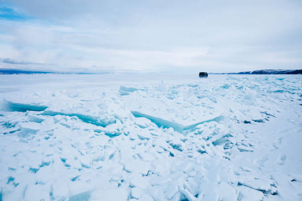 istock Turquoise ice floe. Baikal lake Winter landscape. 1942439683