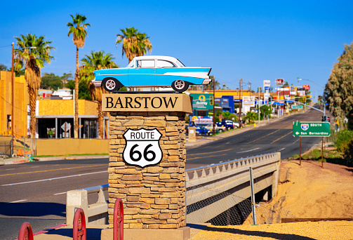 Barstow, California, United States - August 31, 2023: Route 66 pedestal  in Main Street in Barstow, which is part of the old Route 66, has several pedestals with vintage cars on top. This one represent the state of Illinois.