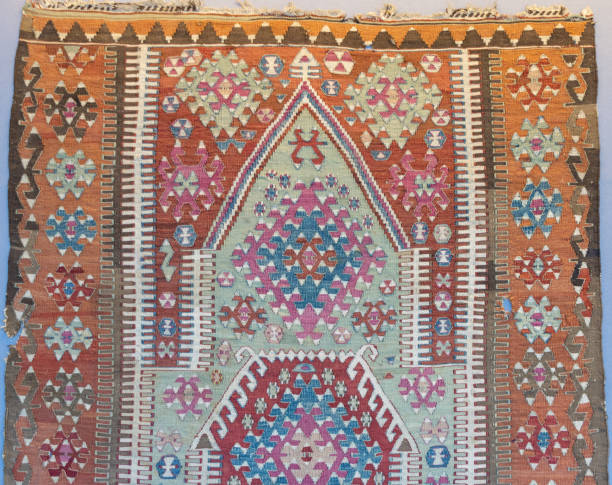 istock Examples of old historical Ottoman, Turkish, Middle Eastern and Iranian carpets and rugs 1942454334