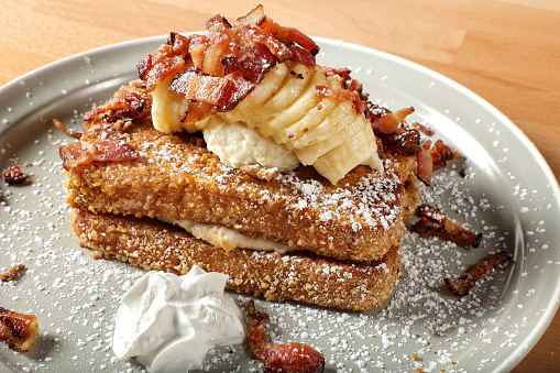 Close up french toast plate on table