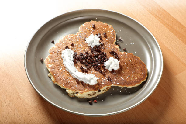 istock Close up cute pancake breakfast in ceramic plate on wooden table 1942468085
