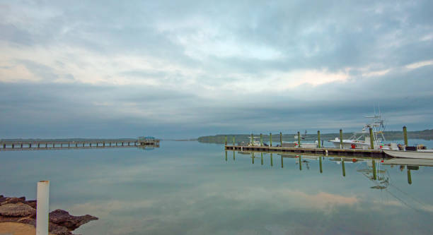 istock Boat Dock in early moring with reflection- Hilton Head, South Carolina 1942489545