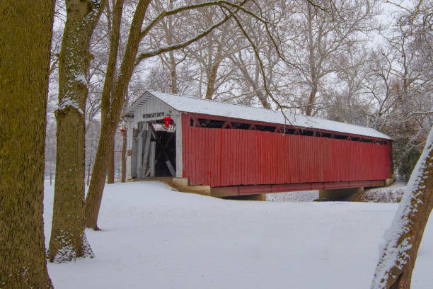 istock Covered Bridge in the Snow- Howard County, Indiana 1942491106