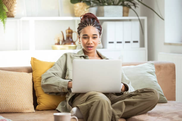 istock Happy young women during video call at home 1942514645