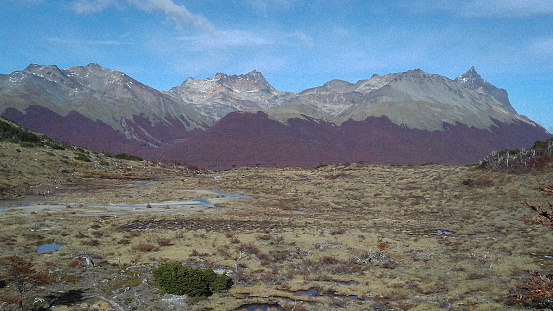 Valley and andes mountains landscape day scene, laguna esmeralda hiking road, tierra del fuego province, argentina