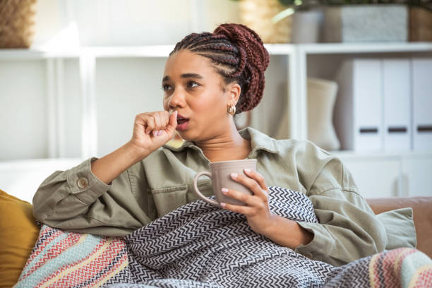 istock Young women feeling unwell, coughing 1942522544
